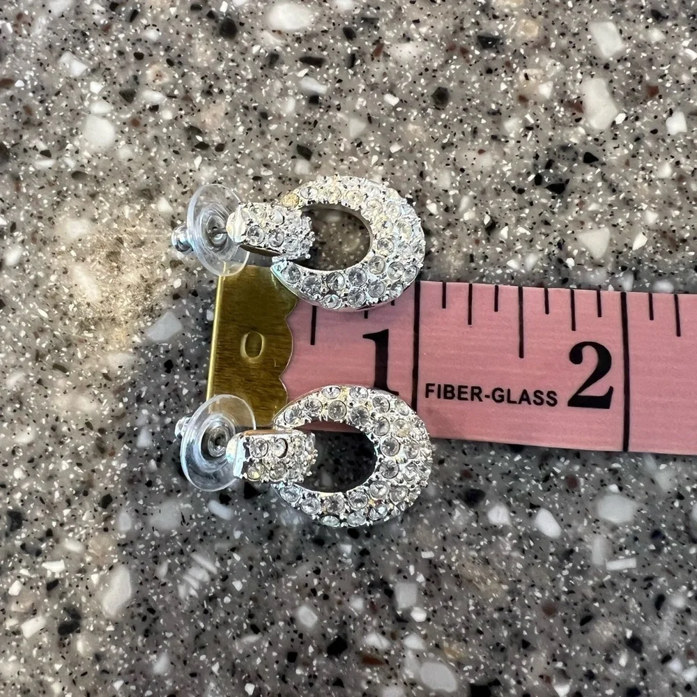 Napier silvertone & sparkling crystal door knocker style pierced earrings